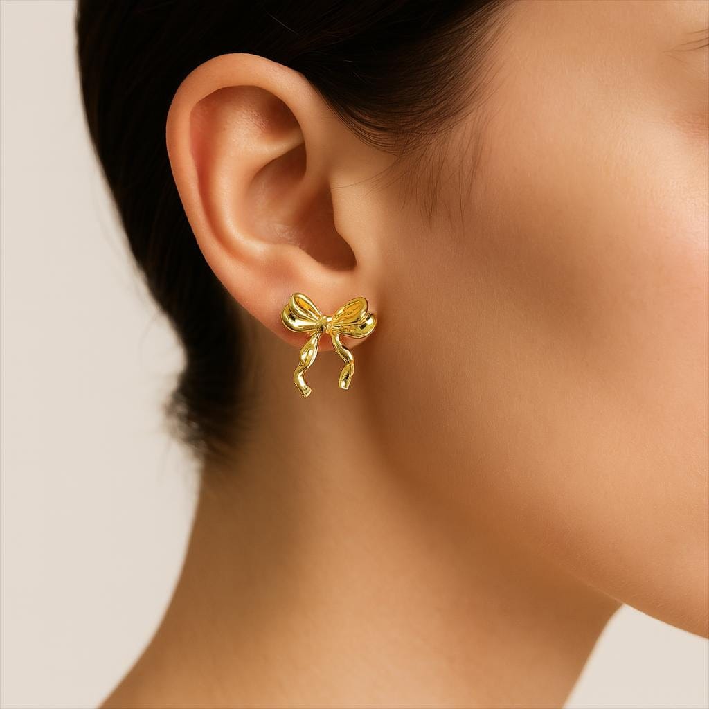 Boucle doreille noeud or